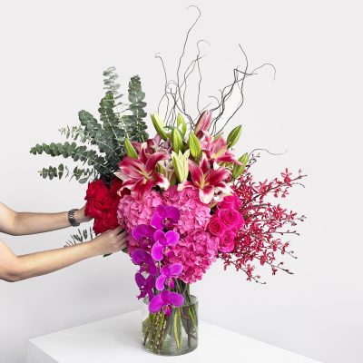 Hollywood Vase Arrangement Lifestyle with Hand Lifestyle